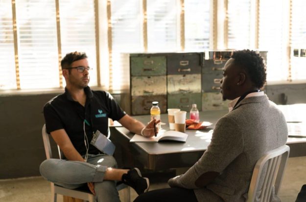 Two men interview
